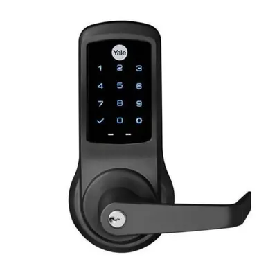 a cell phone hooked up to a door handle at 48-5RW 1BR Apartment in Midtown West W D in New York