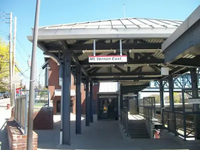 a train station with a sign that reads will terminal east at Urban Bedroom in Mount Vernon