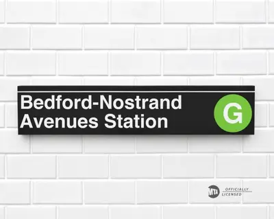 a sign for the bedford museum ofnsics station on a wall at Tuk Ahoy - Sunset Suite 2B with Shared Spaces in Brooklyn
