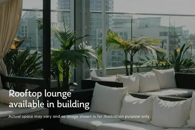 a room with white pillows and plants on a building at Theater District Studio w Indoor pool NYC-142 in New York