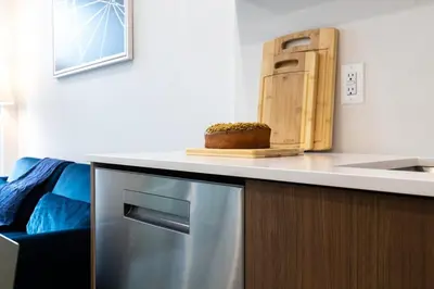 a kitchen with a refrigerator and a counter top at 149BK-302 New Construction 1BR WD in unit Balcony in Brooklyn