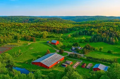an aerial view of a farm with a barn at 2BR Premium Duplex Close to Ski Slopes in Pleasant Mount