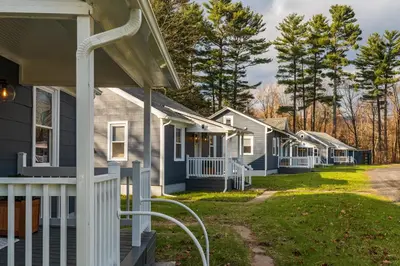 a row of houses in a row at Perch Cottages #13 - Creek Access, Sauna, Mt views in Boiceville