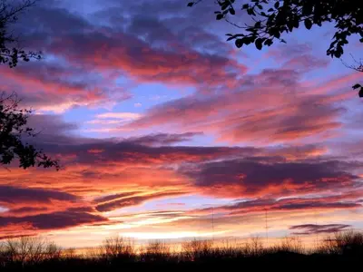 a sunset with colorful clouds in the sky at Unique Vacation Rental on a Working Farm near Hudson, New York in Hudson