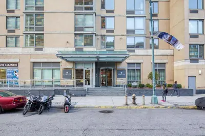 two motorcycles parked in front of a building at Blueground LIC pool wd nr Gantry Park NYC-1845 in New York