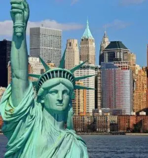 a statue of the statue of liberty in front of a city at 2 Bedroom Apt in LIC, Private WITH BACKYARD ! in Roosevelt Island