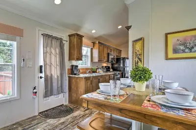 a kitchen with a table with dishes on it at Family Suites Close to Elk Mountain Ski Resort in Pleasant Mount