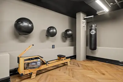 a boxing gym with a punching bag on the wall at Freeman 1201 by Rove Travel - Studio with Shared Amenities in New York