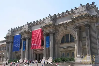 a large building with flags in front of it at Spacious 1-Bedroom Retreat Near Central Park in New York