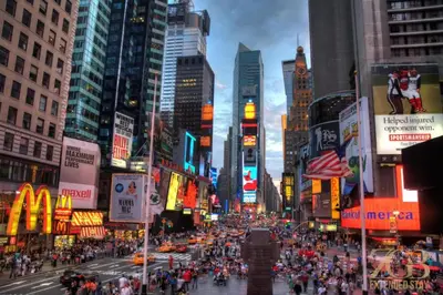 a busy city street with a crowd of people at Renovated 2 Bed 2 Bath Apt in Prime Midtown - Elevator - Laundry in New York