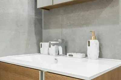 a bathroom sink with rolls of toilet paper on it at 1597-1 Large studio W D in the unit prime UES in New York
