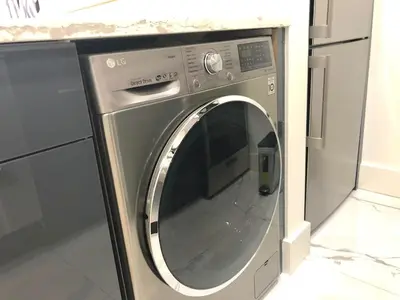 a stainless steel washing machine in a kitchen at 1597-6 Luxury Studio Upper East Side W&D in New York