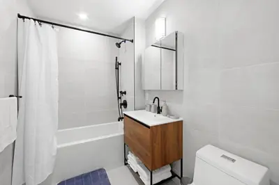 a bathroom with a sink and a toilet and a shower at 149BK-501 NEW Prime greenpoint 2BR WD in unit in Brooklyn
