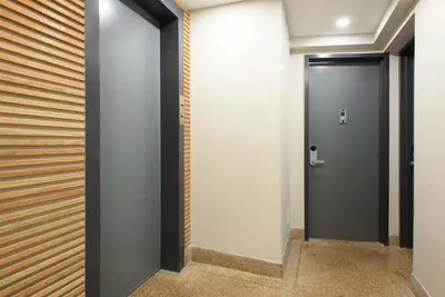 a corridor with a door in a building at 75-1A NEW Prime UES W D in unit Elevator in New York